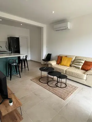 Coin salon dans l'établissement Appartement Soveria