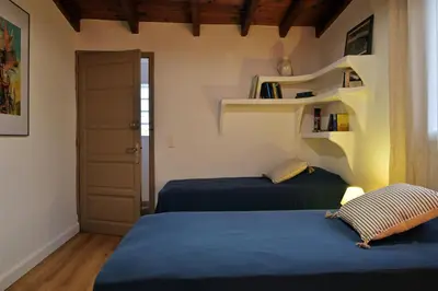 Un ou plusieurs lits dans un hébergement de l'établissement Domaine Punta della Guardia villa panorama maquis et mer, plage à 1,5 Km