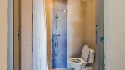 Salle de bains dans l'établissement MAISONNETTE 6 PERS PROCHE L'ILE ROUSSE