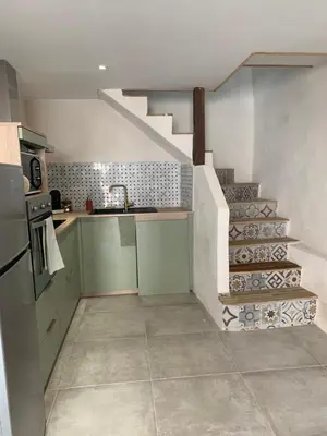Cuisine ou kitchenette dans l'établissement Très jolie maison aux portes du Cap Corse