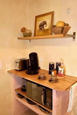 Cuisine ou kitchenette dans l'établissement studio, vue sur mer et montagne