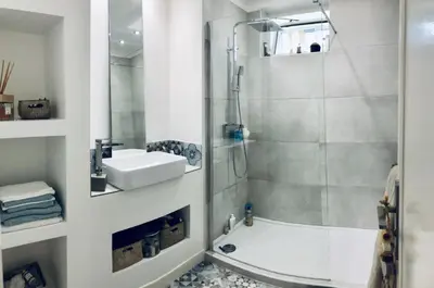 Salle de bains dans l'établissement Appartement face à la mer