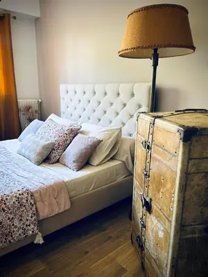 Un ou plusieurs lits dans un hébergement de l'établissement Appartement face à la mer
