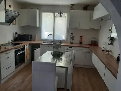 Cuisine ou kitchenette dans l'établissement T2 nath