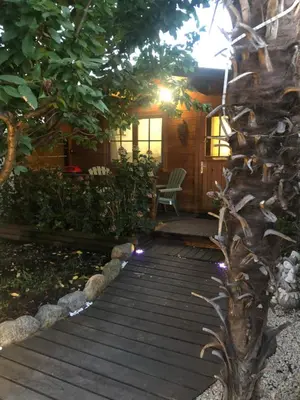 Jardin de l'établissement Chalet - Piscine - Wifi