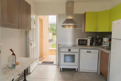 Cuisine ou kitchenette dans l'établissement Residence Scopa Marina