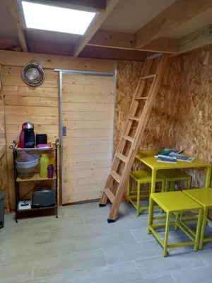 Un ou plusieurs lits superposés dans un hébergement de l'établissement Casa di legnu ,charmant chalet avec piscine
