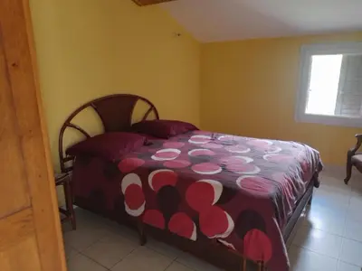 Un ou plusieurs lits dans un hébergement de l'établissement Maison de caractère au coeur de la corse rurale