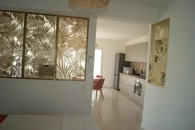Cuisine ou kitchenette dans l'établissement Bel appartement avec vue sur mer - Les Palmiers