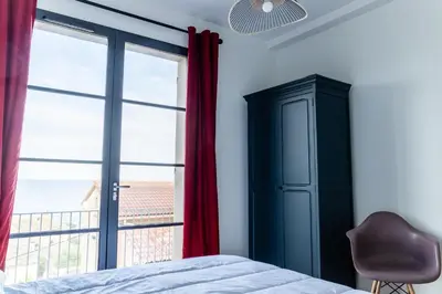 Un ou plusieurs lits dans un hébergement de l'établissement VILLA ELBA