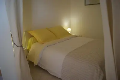 Un ou plusieurs lits dans un hébergement de l'établissement Vue sur mer à Santa Severa - Appartement Les Cyprès