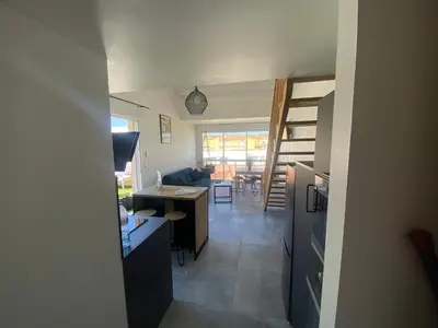 Télévision ou salle de divertissement dans l'établissement DUPLEX CALVI DIRECT PLAGE