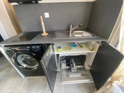 Cuisine ou kitchenette dans l'établissement DUPLEX CALVI DIRECT PLAGE