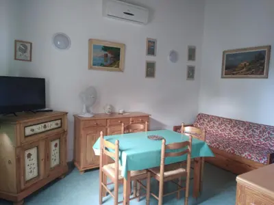 Télévision ou salle de divertissement dans l'établissement Le Râteau Bavoir