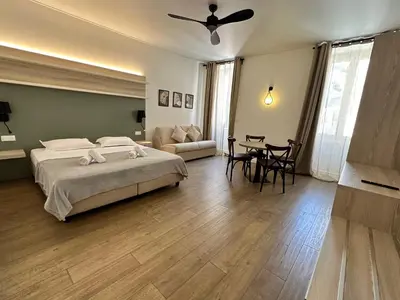 Un ou plusieurs lits dans un hébergement de l'établissement Hôtel du Nord
