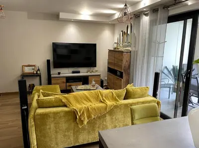 Télévision ou salle de divertissement dans l'établissement Appartement calme proche Bastia