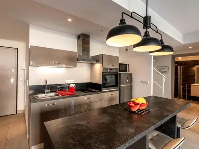Cuisine ou kitchenette dans l'établissement Apartment Résidence les 3C by Interhome