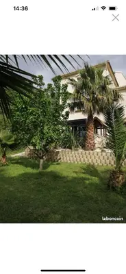 Jardin de l'établissement Maison 9 couchages avec piscine et jardin au calme