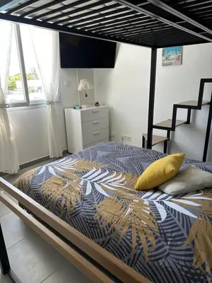 Un ou plusieurs lits dans un hébergement de l'établissement A 700m de la plage,villa FAMIGLIA avec piscine