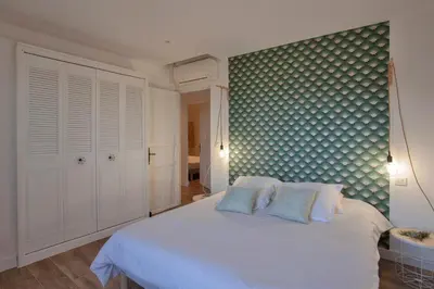 Un ou plusieurs lits dans un hébergement de l'établissement Casa Lisa - appartement dans le village de Monticello vue mer