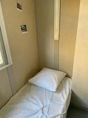 Un ou plusieurs lits dans un hébergement de l'établissement Chalet climatisé avec patio en Haute Corse 5 couchages