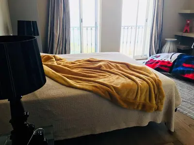 Un ou plusieurs lits dans un hébergement de l'établissement Magnifique triplex face à la Mer