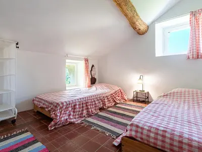 Un ou plusieurs lits dans un hébergement de l'établissement Holiday Home Maison Penta by Interhome