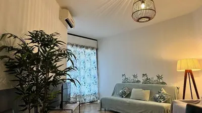 Un ou plusieurs lits dans un hébergement de l'établissement Studio pied dans l'eau - WIFI- Piscine