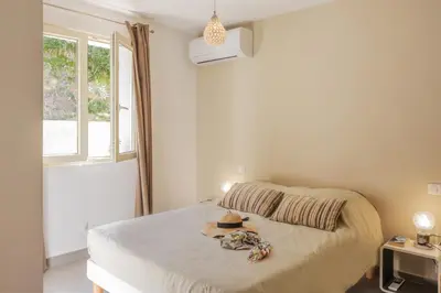 Un ou plusieurs lits dans un hébergement de l'établissement Appartement vue mer Fromontica