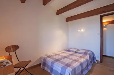 Un ou plusieurs lits dans un hébergement de l'établissement Casa Poggio
