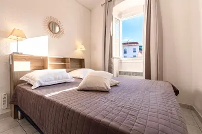 Un ou plusieurs lits dans un hébergement de l'établissement Alla Casa - Appt pour 6 avec terrasse