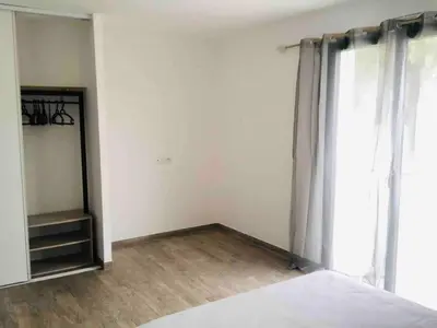 Un ou plusieurs lits dans un hébergement de l'établissement U Primu Appartement spacieux au calme Aléria
