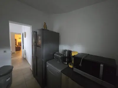 Cuisine ou kitchenette dans l'établissement villa gambotti