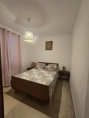 Un ou plusieurs lits dans un hébergement de l'établissement villa gambotti