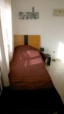 Un ou plusieurs lits dans un hébergement de l'établissement VILLA T3 bord de mer - vue mer à 500 m de la plage- piscine chauffée A CASETTA DI A SPIAGGIA