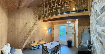 Coin salon dans l'établissement Gîte chez Arthur